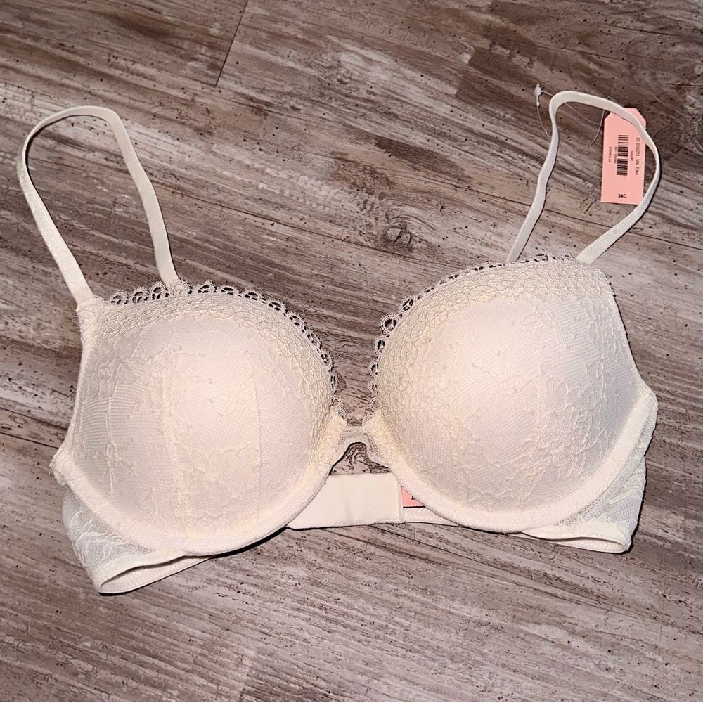 NWT DOBREVA ivory deep plunge